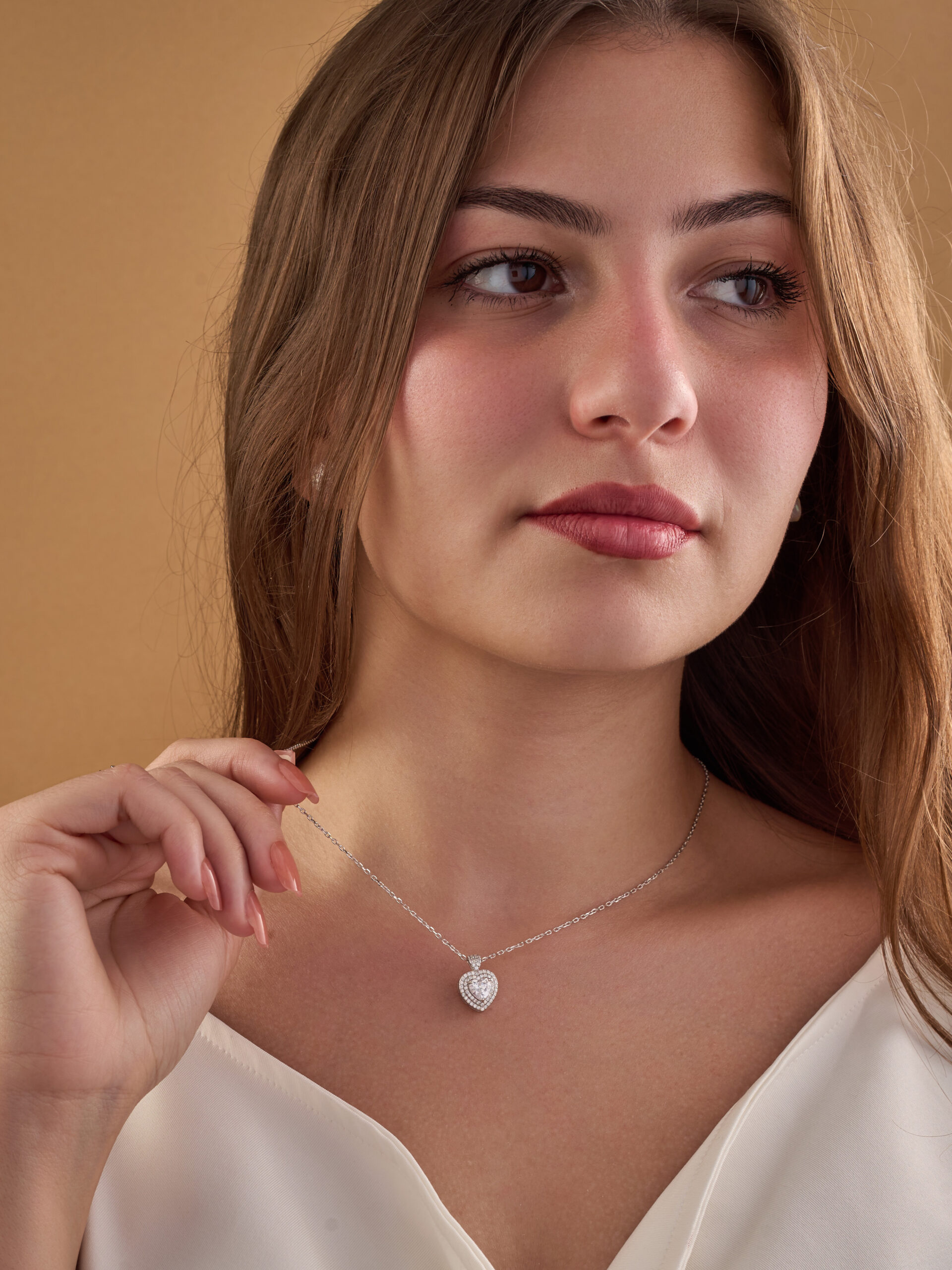 Silver necklace in the shape of a heart , inlaid with white zircon stones. - Image 3