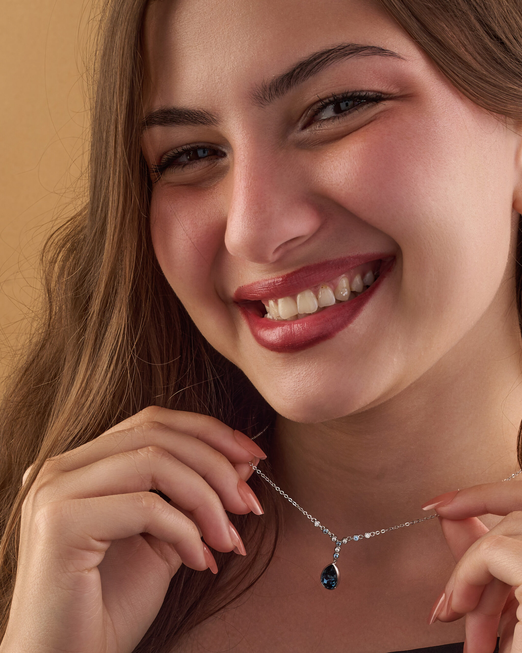 A silver necklace in the shape of a water drop, inlaid with Blue zircon stones. - Image 2